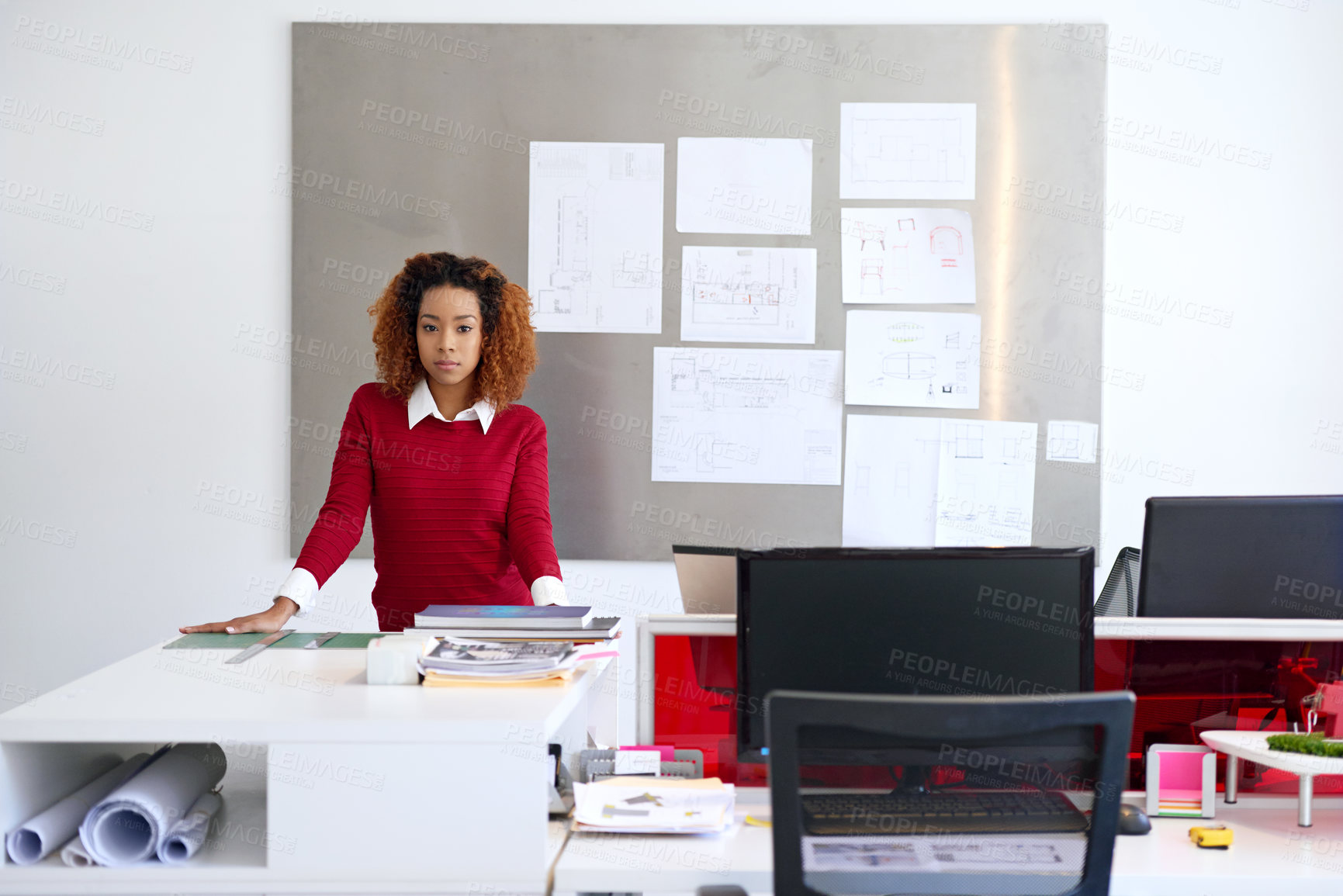 Buy stock photo Portrait of a young woman standing in an office