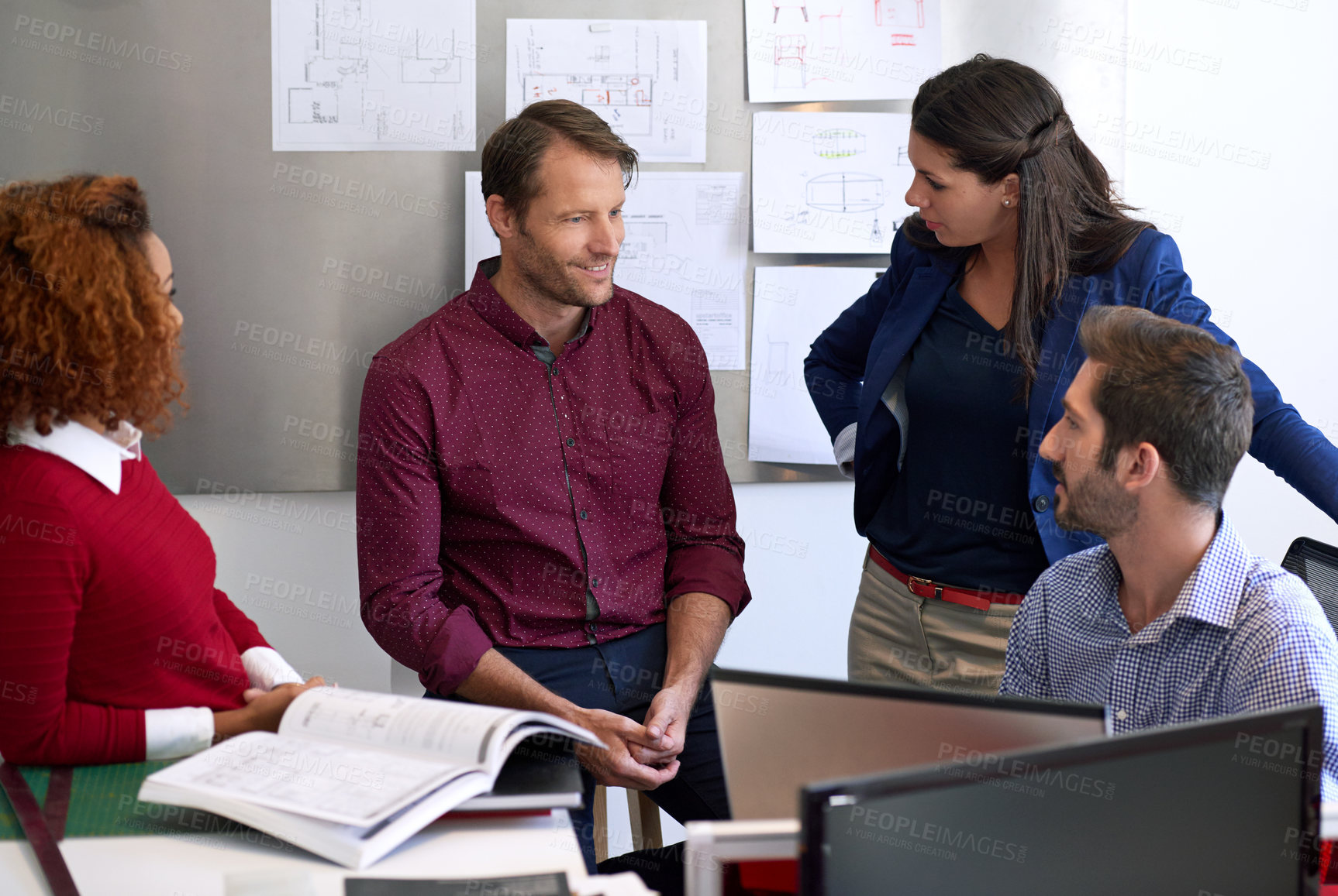 Buy stock photo Cropped shot of young designers discussing work