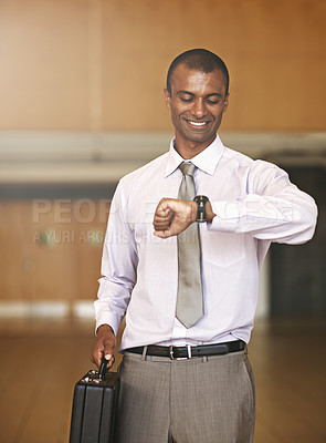 Buy stock photo Cropped shot of a businessman checking the time