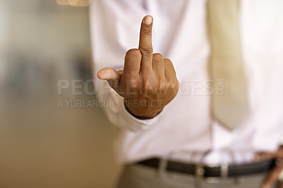 Buy stock photo Cropped shot of an unrecognizable businessman showing his middle finger