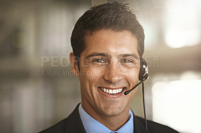 Buy stock photo Cropped portrait of a businessman communicating using his headset