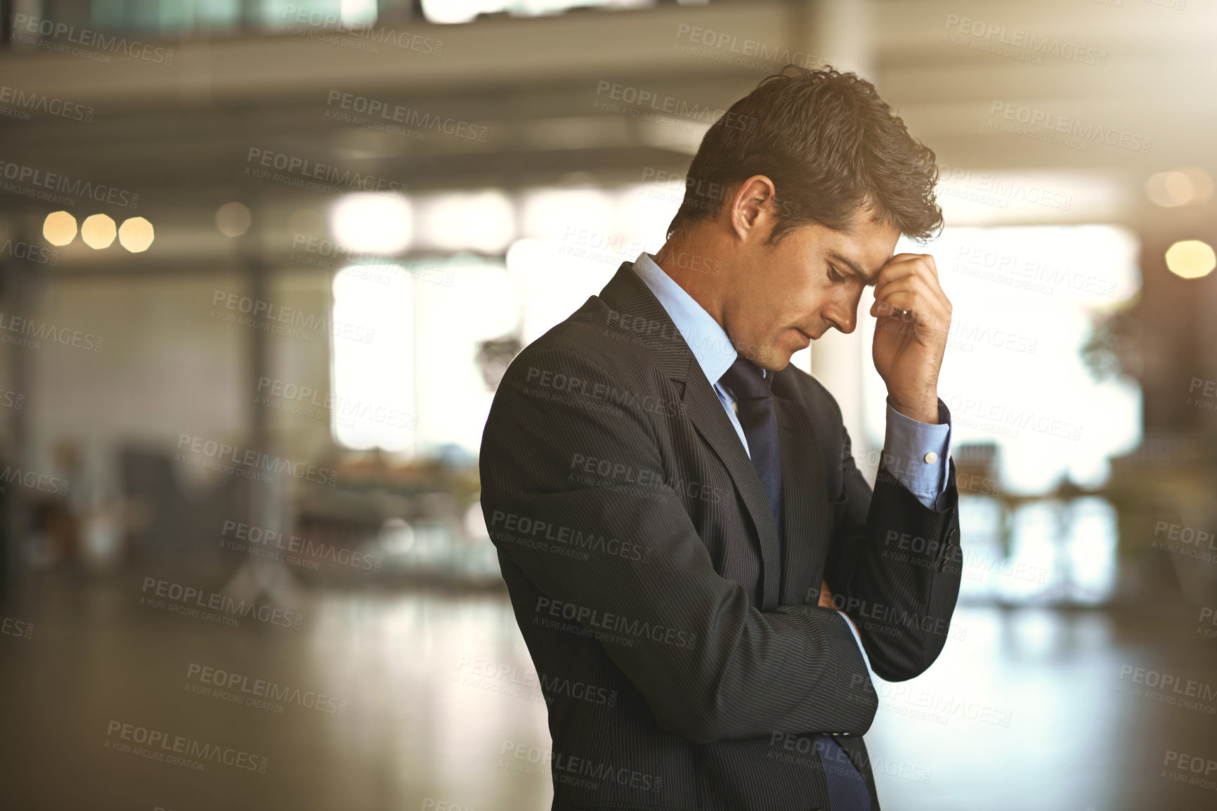 Buy stock photo Headache, stress businessman standing and at his office  sad or upset at debt fail at work. Mental health or anxiety, burnout and exhausted or depressed male corporate worker frustrated and tired