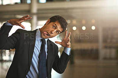 Buy stock photo Cropped portrait of a businessman gesturing crazily in the office
