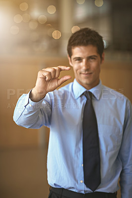 Buy stock photo Cropped shot of a businessman making a 