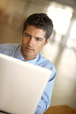 Buy stock photo Laptop, focus and business man with online management, career planning and company software or website. Serious, office and professional person or worker reading digital news or working on computer