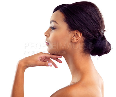 Buy stock photo Studio shot of a young woman with perfect skin posing against a white background