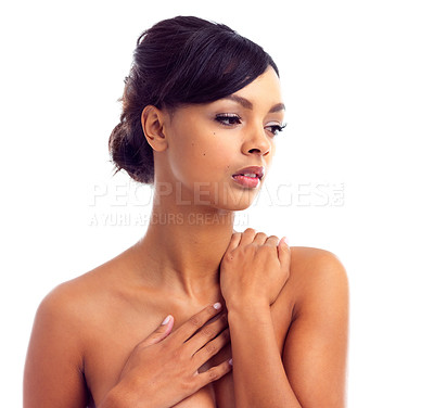 Buy stock photo Studio shot of a young woman with perfect skin isolated on white