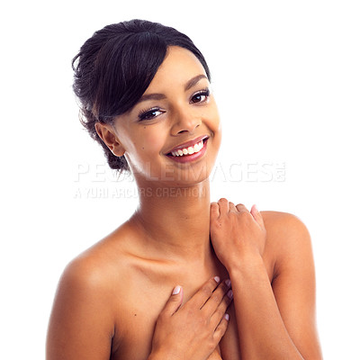 Buy stock photo Studio portrait of a young woman with perfect skin isolated on white