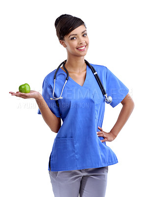 Buy stock photo Studio shot of a young medical professional holding an apple isolated on white