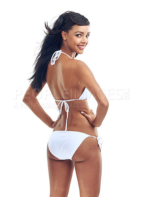 Buy stock photo Studio shot of a young woman in a bikini isolated on white