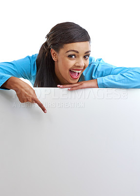 Buy stock photo Studio shot of a young woman on top of a blank white wall with copyspace