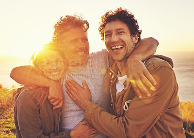 Buy stock photo Portrait of three friends standing on a hill top at sunset