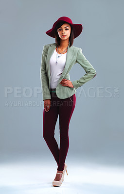 Buy stock photo Full length studio portrait of a stylish young woman posing against a gray background