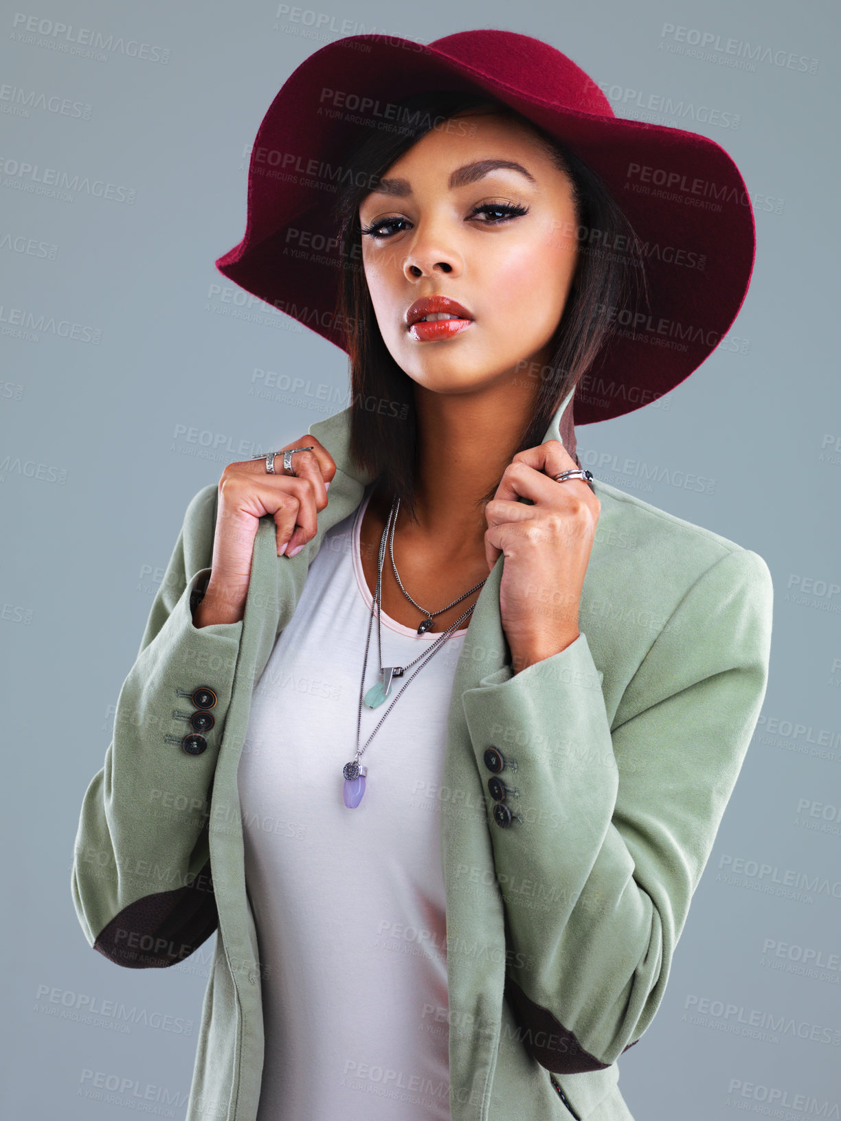 Buy stock photo Fashion, beauty and portrait of woman in studio with trendy clothes, stylish and elegant outfit. Confident, attractive and isolated person with pride in style, hat and accessory on gray background
