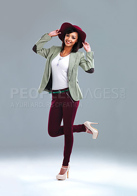 Buy stock photo Full length studio portrait of a stylish young woman posing against a gray background