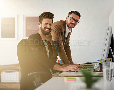 Buy stock photo Cropped shot of two designers working in an office