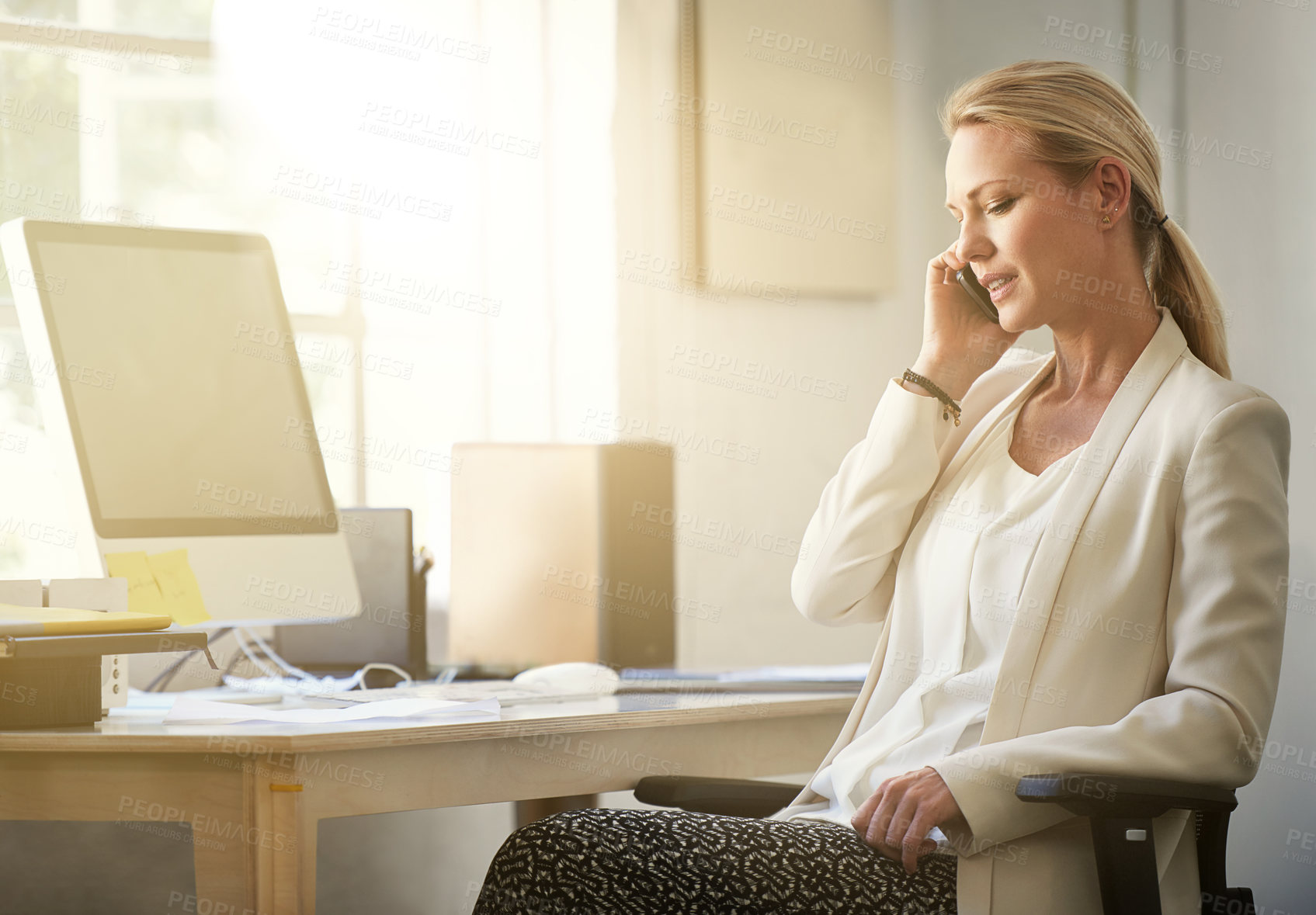 Buy stock photo Small business, woman and smartphone in office for phone call, creativity and networking on desk. Web designer, communication and planning in workplace for startup, pride or confidence with talking