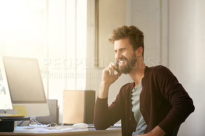 Buy stock photo Cropped shot of a businessman talking on his cellphone while sitting in his office