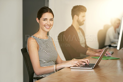 Buy stock photo Small business, businesswoman and portrait in coworking meeting for design, office and smile at computer. Web designers, desk and face in workplace for startup, pride and confidence with technology