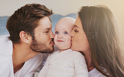 Buy stock photo Happy father, mother and kiss baby on cheek for love, care and quality time to relax together in family home. Mom, dad and kissing cute newborn kid for happiness, loving support or infant development