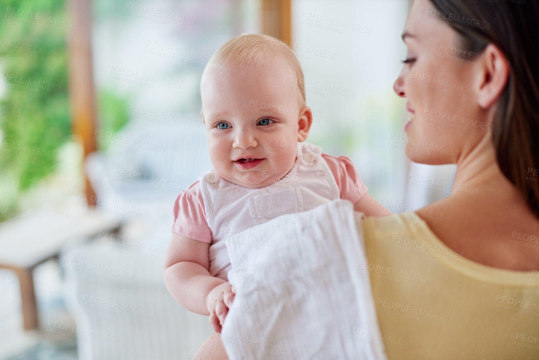 Buy stock photo Family, shoulder and mother with baby in home for bonding, relationship and care for motherhood. Happy, portrait and mom carrying newborn infant for child development, love and affection in house