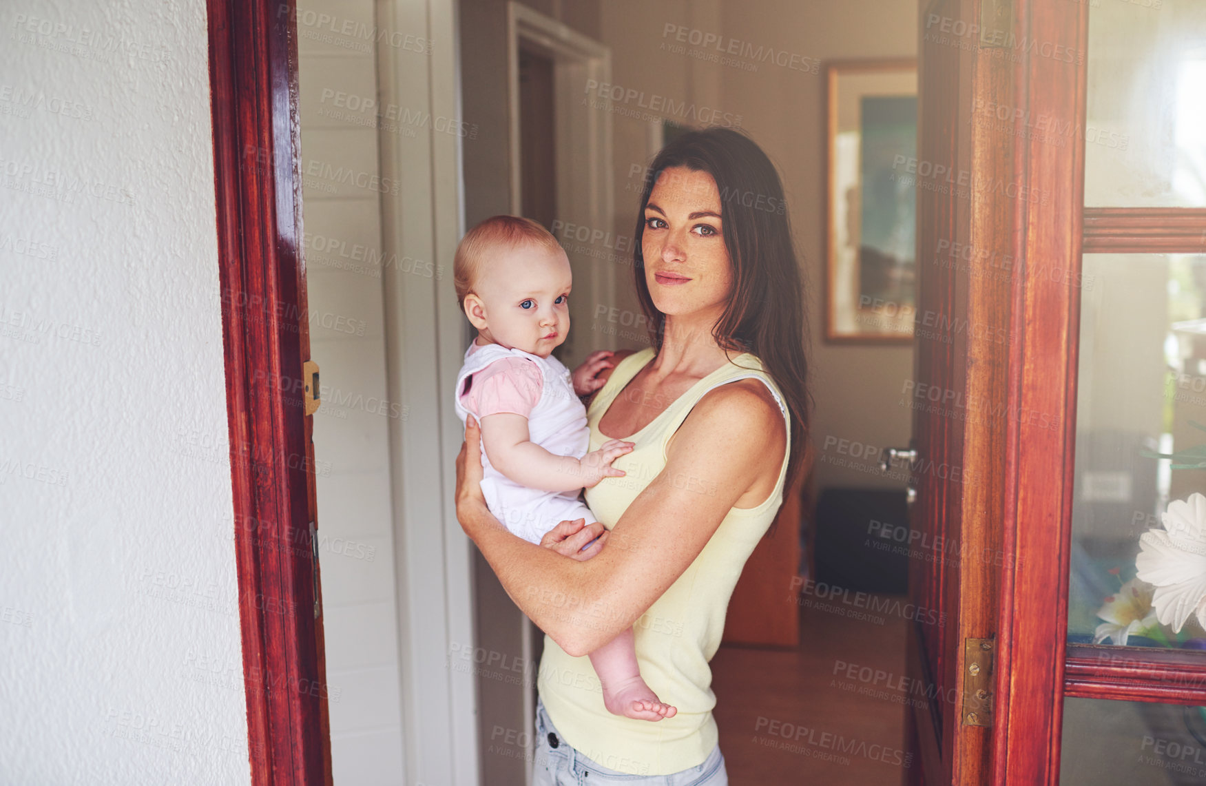 Buy stock photo Door, home and portrait of baby with mother for bonding, parenting and relax together in house. Happy, family and mom carrying newborn infant for child development, support and love in morning