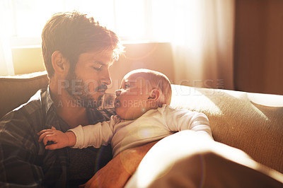 Buy stock photo Love, morning and father with baby on sofa for bonding, relationship and care for parenting. Family, home and dad with newborn infant for child development, support and affection in living room