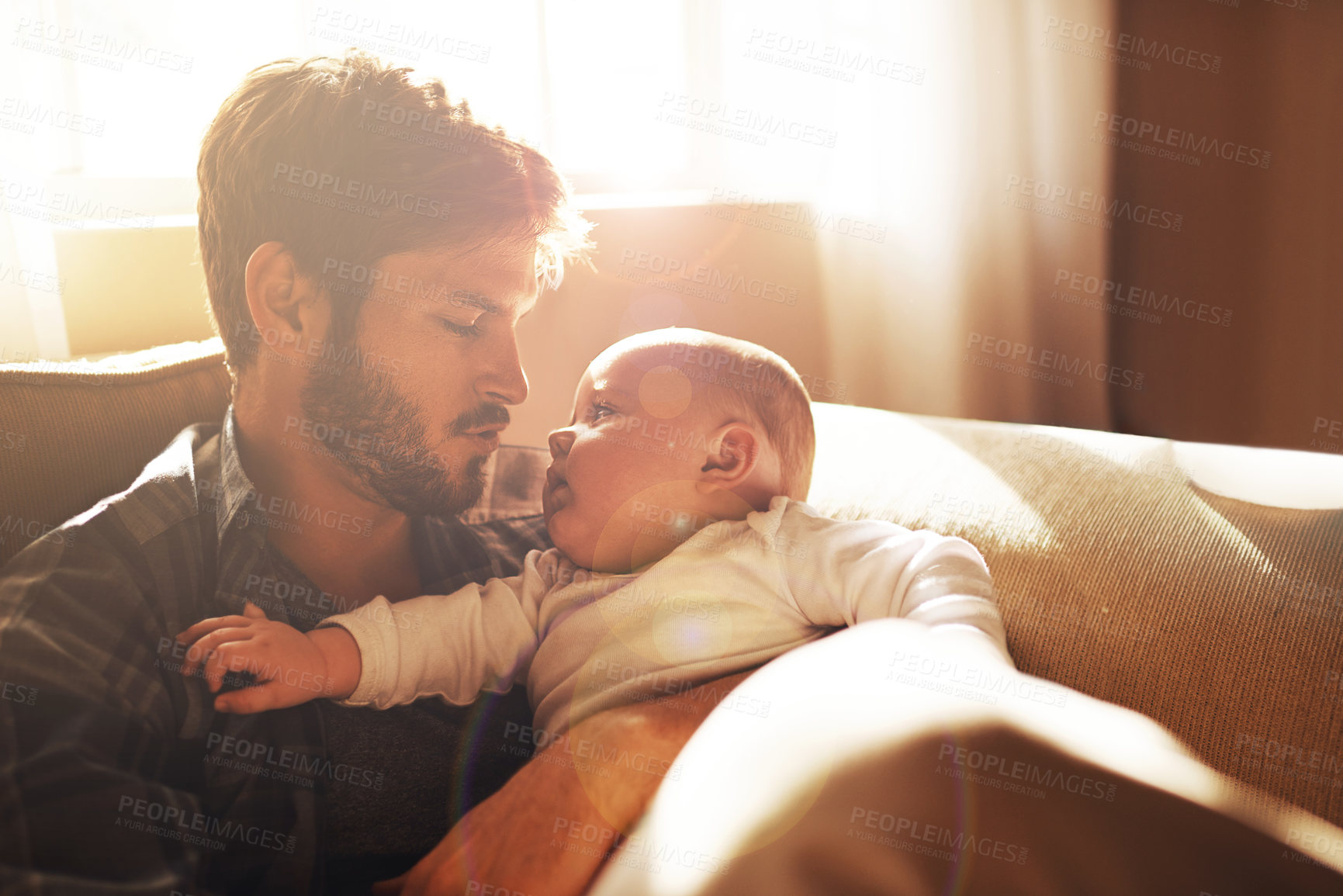 Buy stock photo Love, morning and father with baby on sofa for bonding, relationship and care for parenting. Family, home and dad with newborn infant for child development, support and affection in living room