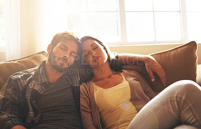 Buy stock photo Sleeping, tired and couple on sofa to relax with sunshine for resting, comfortable and dreaming in home. Marriage, dating and man and woman on couch together for cuddle, nap and asleep in living room