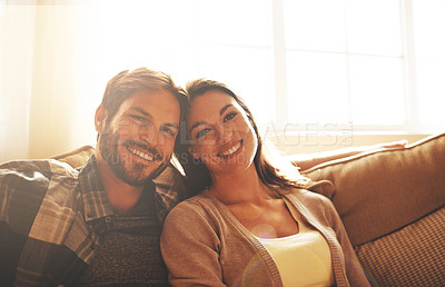 Buy stock photo Love, happy and portrait of couple on sofa for bonding, loving relationship and relax together in home. Marriage, morning and man and woman on couch with smile, embrace and hugging in living room