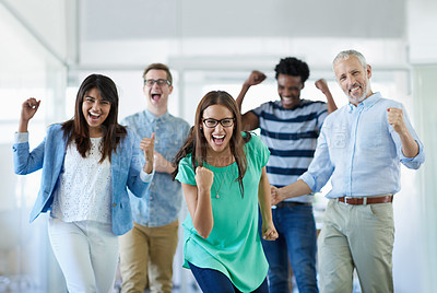 Buy stock photo Cropped portrait of a group of businesspeople cheering in an office