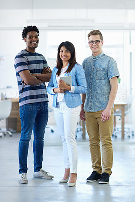 Buy stock photo Cropped portrait of three coworkers standing in the office