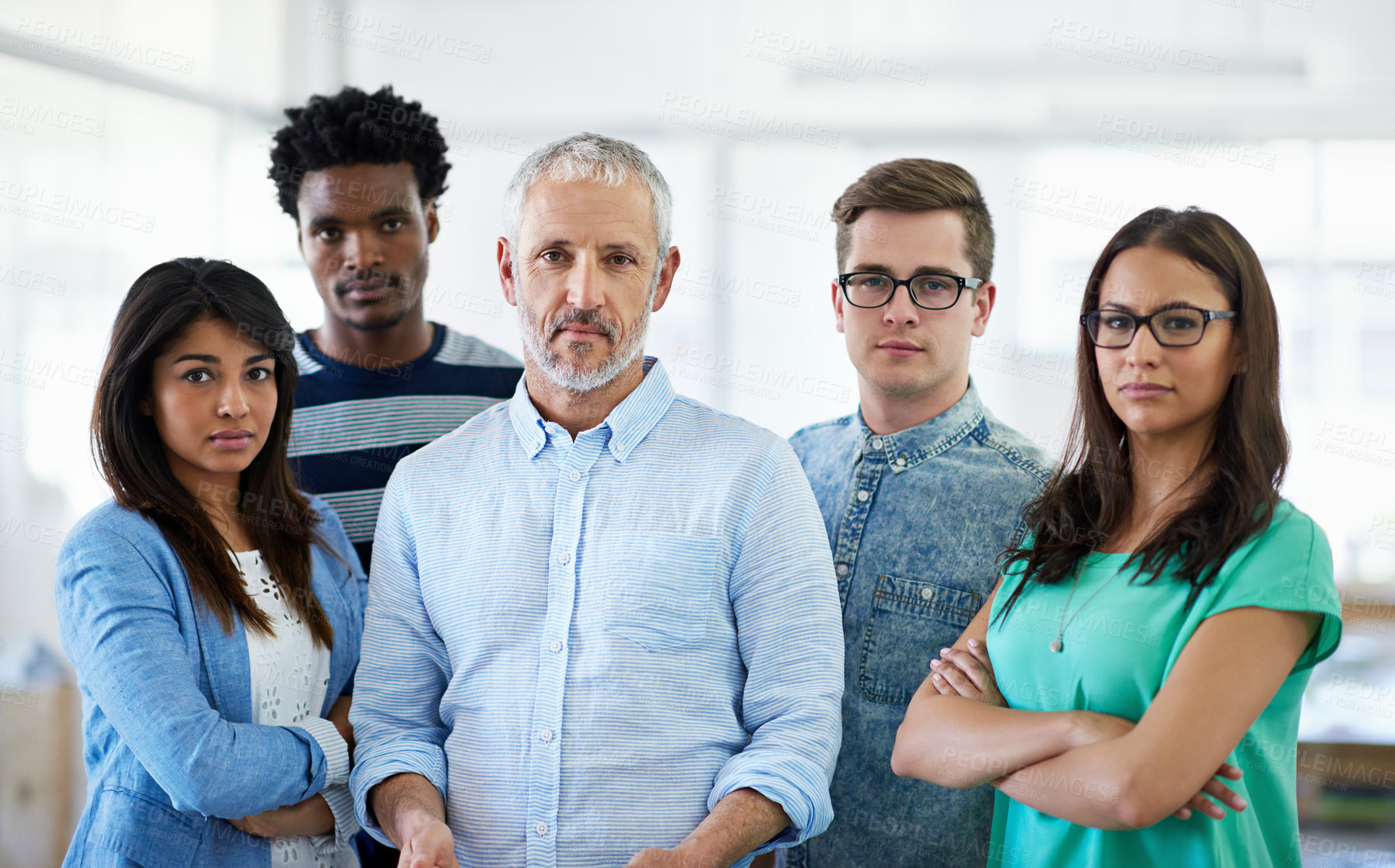 Buy stock photo Cropped portrait of a group of creative businesspeople in the office