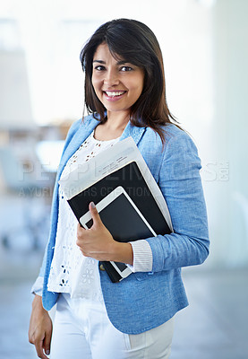 Buy stock photo Cropped portrait of a young businesswoman in the office corridor