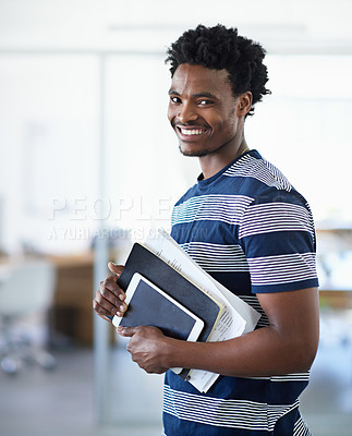 Buy stock photo Cropped portrait of a young businessman in the office corridor