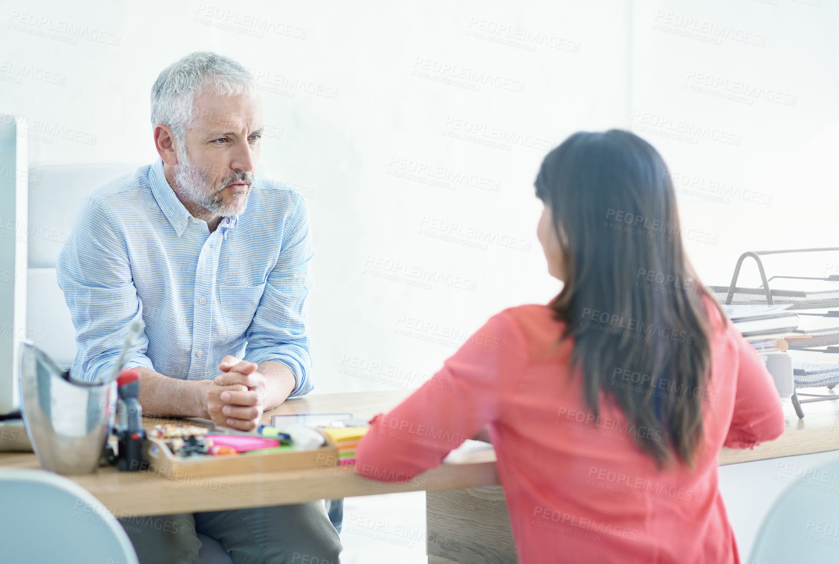 Buy stock photo Cropped shot of a mature businessman meeting with a young employee