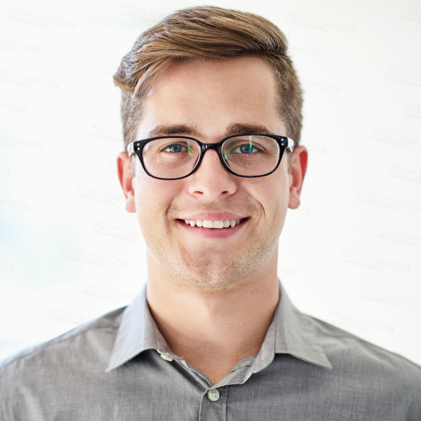 Buy stock photo Cropped portrait of a young businessman wearing glasses