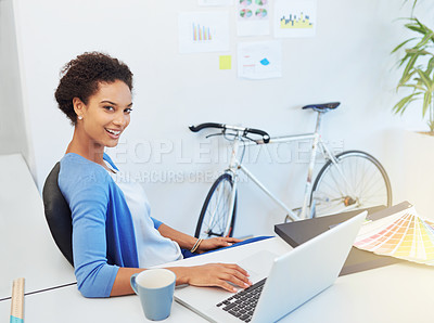 Buy stock photo Cropped portrait of a young architect working on her laptop