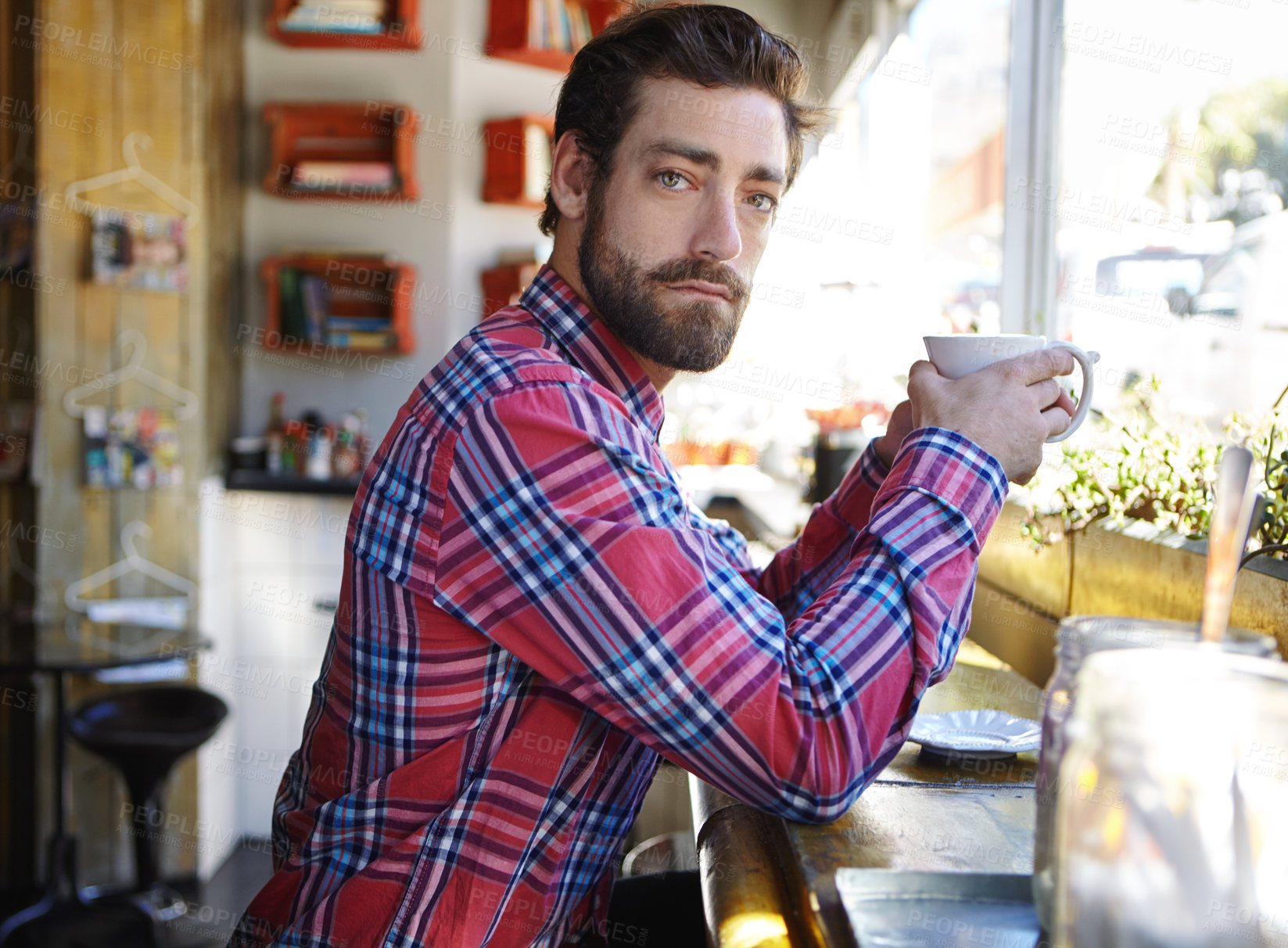 Buy stock photo Portrait, serious and man with coffee at cafe for peace, calm morning and start day with caffeine. Male person, relax and espresso with beverage for customer experience, weekend break and hospitality