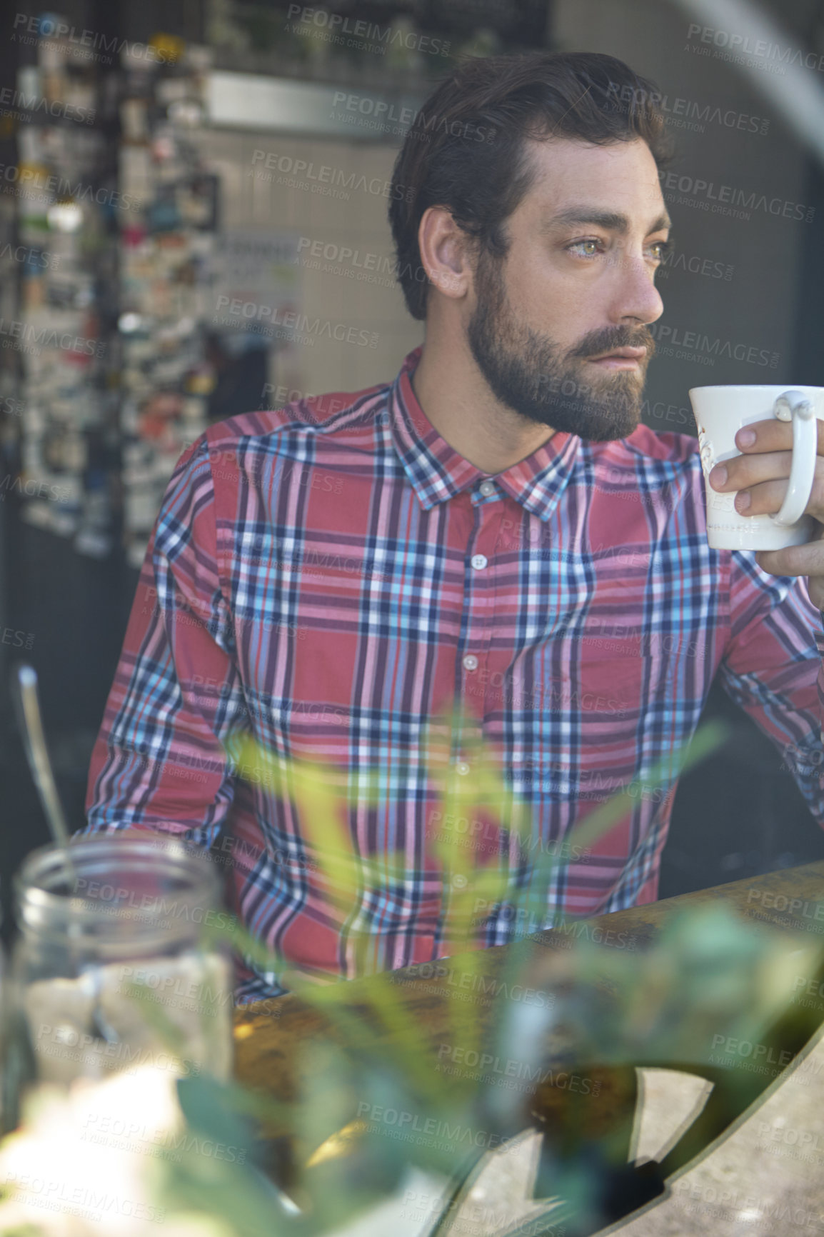 Buy stock photo Man, coffee and thinking in cafe for insight, drink and relax with inspiration at restaurant. Serious, person and cup with reflection, decision and perspective with warm beverage at diner or bistro