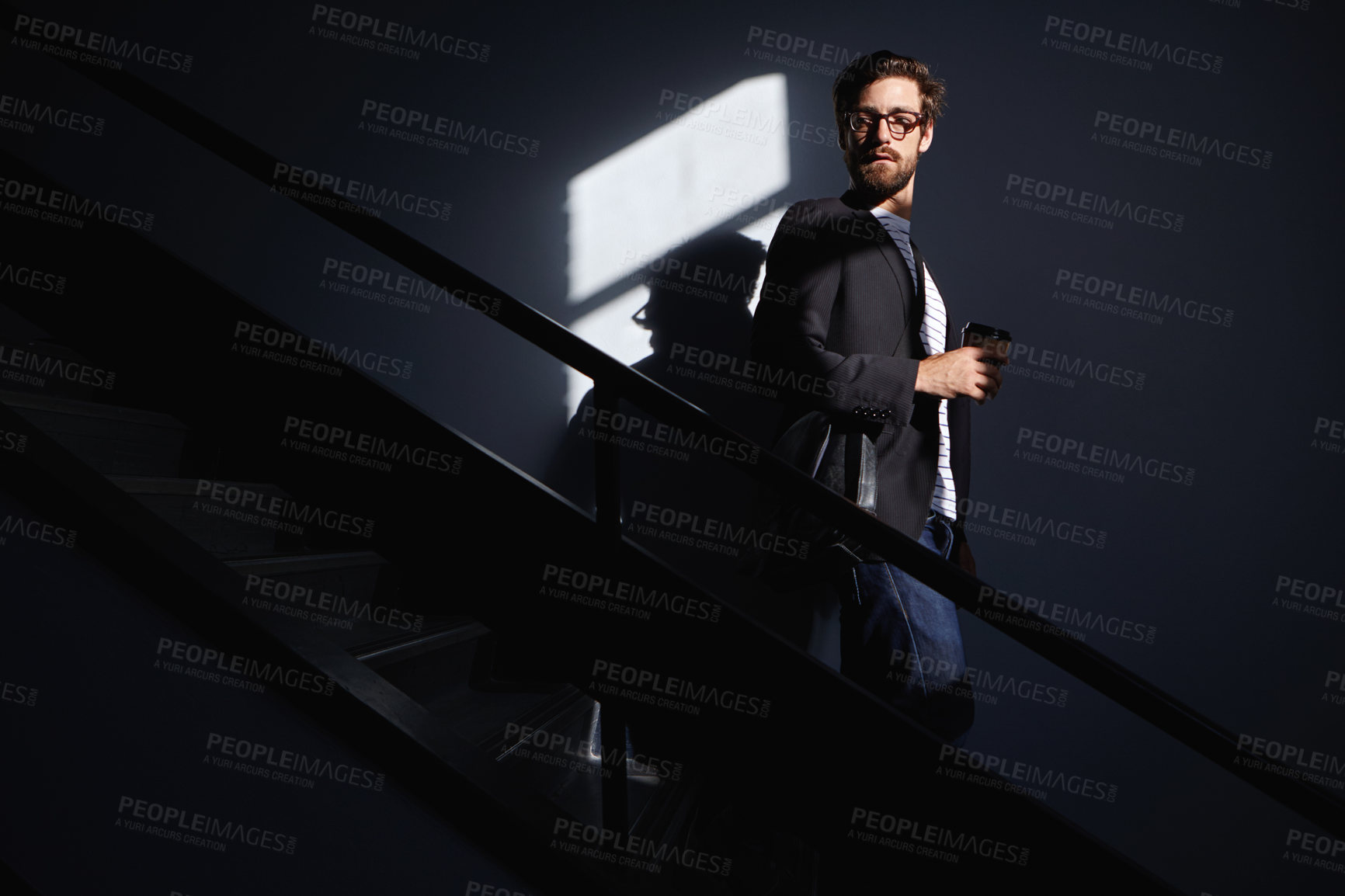 Buy stock photo Thinking, businessman and coffee on dark stairway, introspection or mental preparation for work. Calm, morning reflection and thoughtful person with beverage for career goals, walking space or shadow