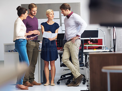Buy stock photo Full length shot of a group of designers working in their office
