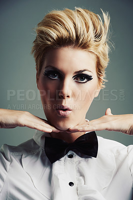Buy stock photo Makeup, bow tie or portrait of woman with fashion, vintage clothes or classy aesthetic on grey background. Face, edgy fashionable model or cool girl with retro style and beauty isolated in studio