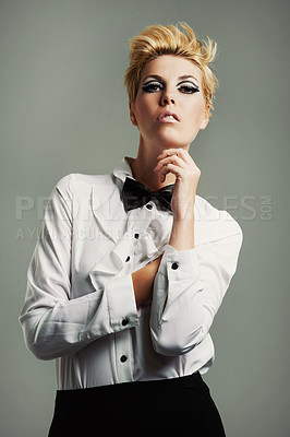 Buy stock photo Makeup, bow tie or portrait of model with fashion, vintage clothes or classy aesthetic on grey background. Confidence, edgy woman or cool girl with retro style, elegance and beauty isolated in studio
