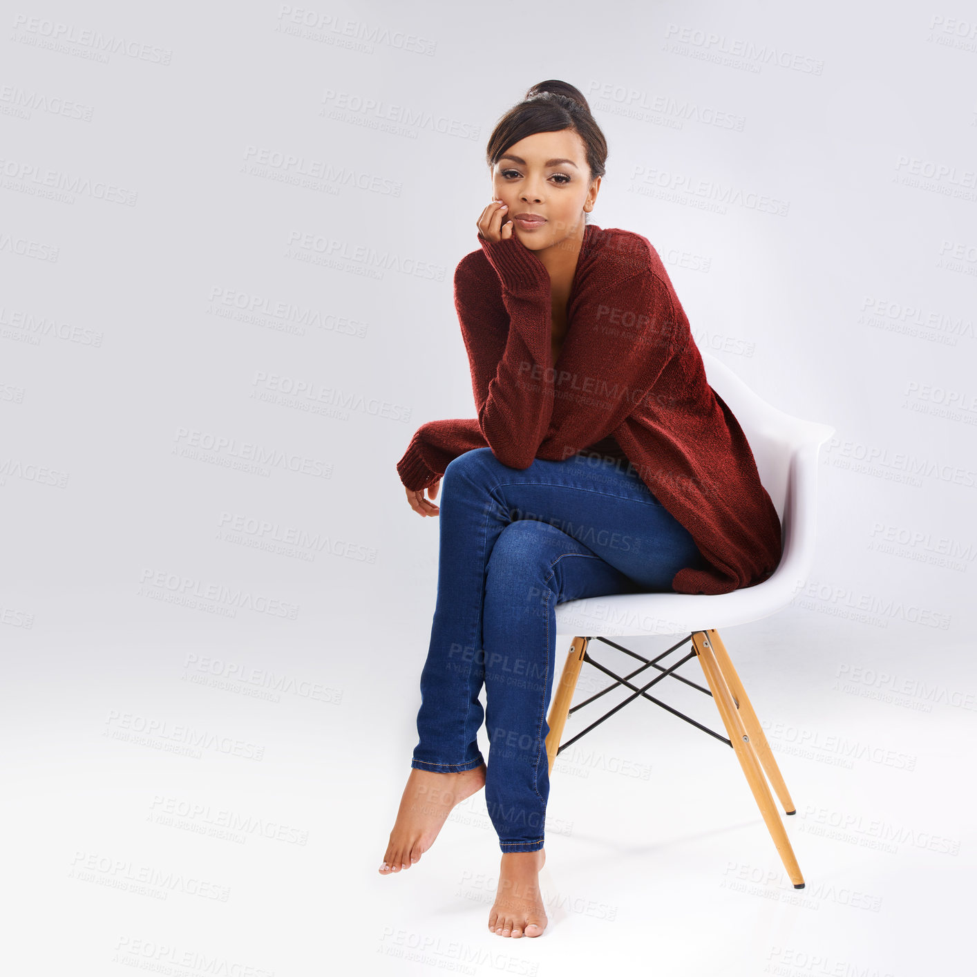 Buy stock photo Fashion, chair and portrait of woman in studio with casual, trendy and stylish outfit for winter. Smile, confident and female person from Colombia with clothes for cold season by white background.