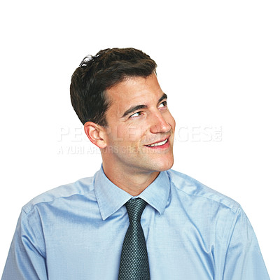 Buy stock photo Studio shot of a young businessman looking thoughtful against a white background