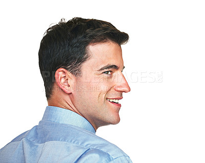 Buy stock photo Studio shot of a young businessman looking back over his shoulder against a white background