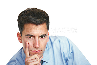 Buy stock photo Studio portrait of a young businessman looking thoughtful against a white background