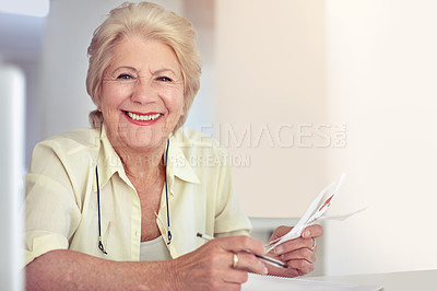 Buy stock photo Portrait, smile and senior woman with a budget, home and planning for savings, insurance and pension. Face, mature female person or happy elderly lady with paperwork, writing and ideas for investment