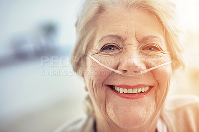 Buy stock photo Portrait, healthcare and recovery with a senior woman in her home after treatment at a hospital or clinic. Face, smile and medical tubes with a happy mature female patient looking healthy closeup